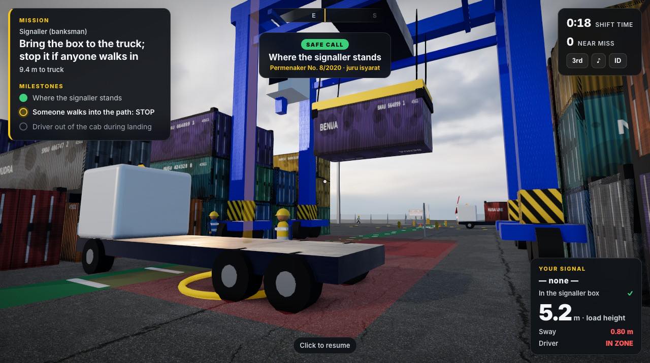 Signaller view of a box coming down onto a truck